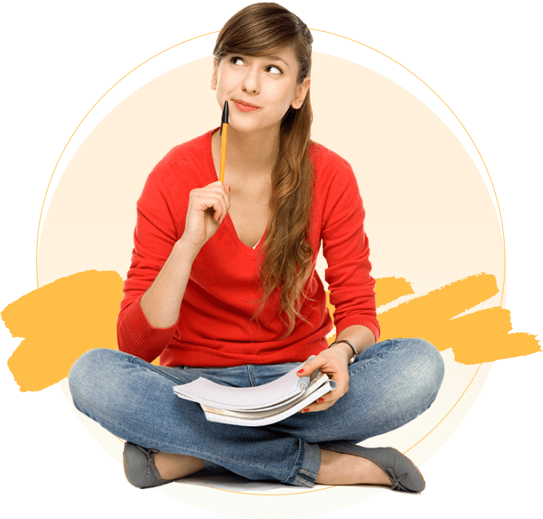 A young lady sits, holding a pen and a notebook